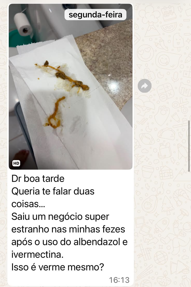 Mensagem de paciente relatando eliminação de parasitas durante o protocolo